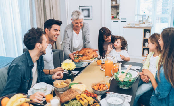 istock Senior woman serving roasted turkey 1139251618