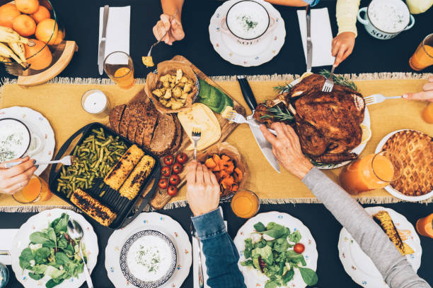 istock Overhead view of table during Christmas dinner 1139251621