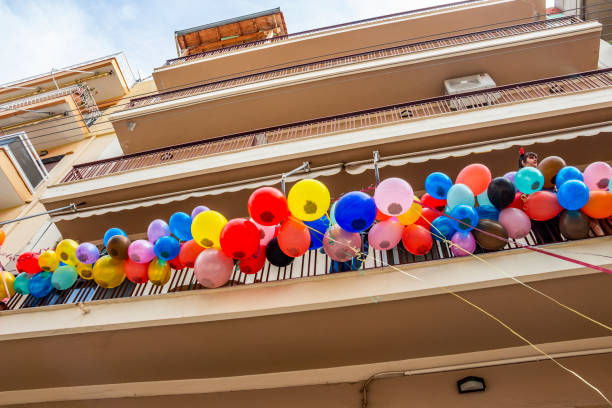 Close-up view of decorative  orange color balloons with air in a birthday