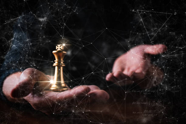 istock business strategy brainstorm chess board game with hand touch black background with free copy space for your text 1139252629