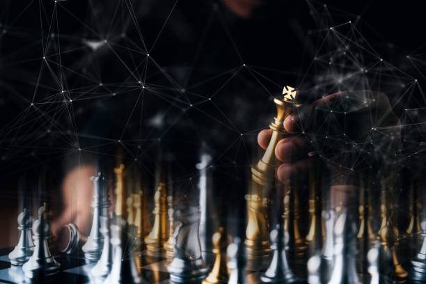 istock business strategy brainstorm chess board game with hand touch black background with free copy space for your text 1139252692