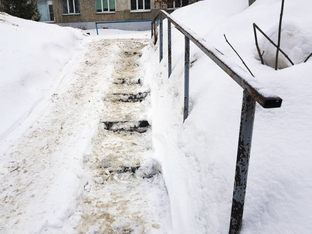 istock Dangerous slippery stairs and old handrail in winter 1139253857