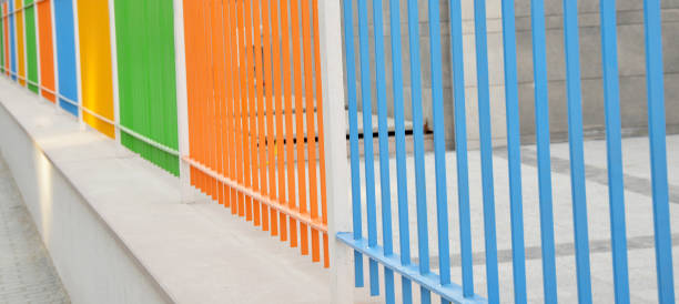 istock abstract colorful background and colored iron fences 1139257346