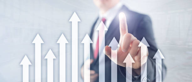 istock Up arrow graph on skyscraper background. Invesment and financial growth concept. 1139257683