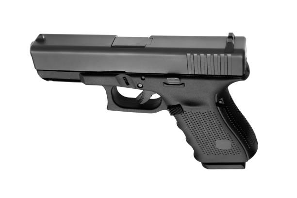 istock black gun pistol isolated on white background 1139258585