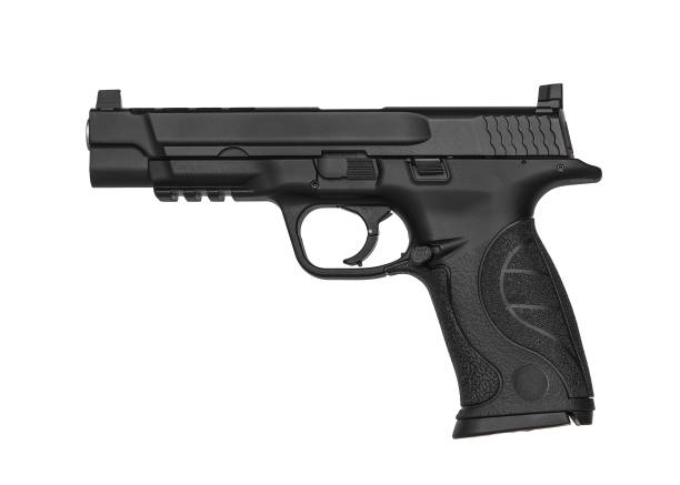 istock Black gun pistol isolated on white background 1139258671