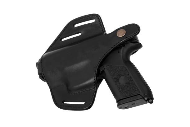istock pistol in a black leather holster isolated on white background 1139258795