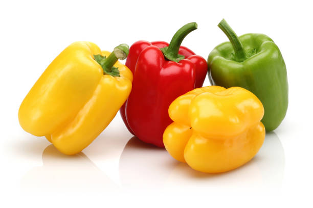 istock Yellow, red and green bell peppers isolated 1139259132