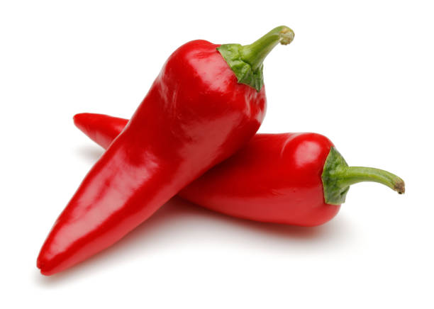 istock Fresh red peppers isolated on white 1139260632