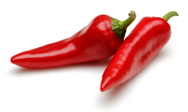 istock Fresh red peppers isolated on white 1139260682