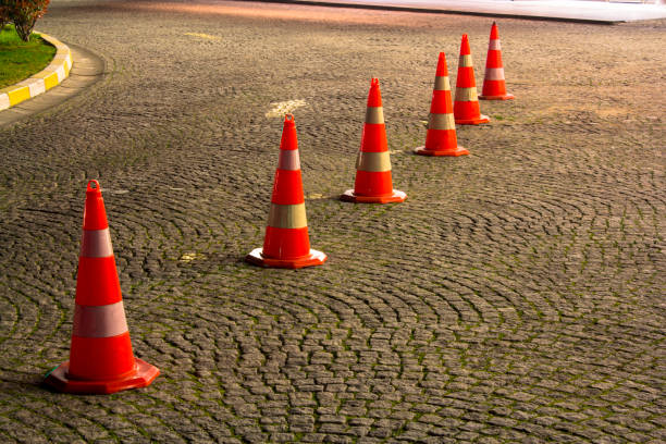 istock Road cones on the pavement before entering somewhere 1139262036