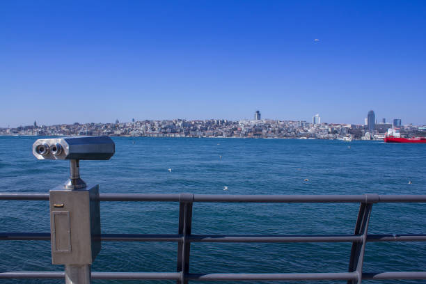 istock Coin operated public binocular by the sea overlooking bosphorus. 1139262133