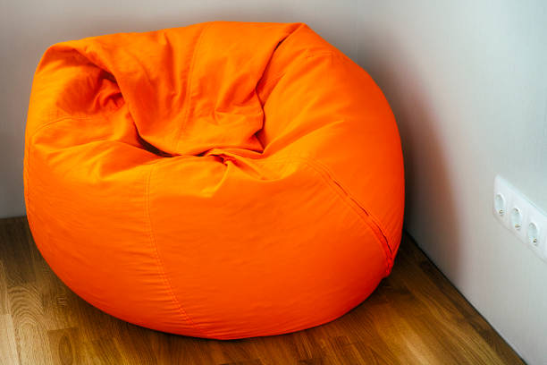 istock Orange beanbag in room corner 1139262147
