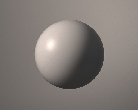 Realistic sphere isolated on gray background.jpg