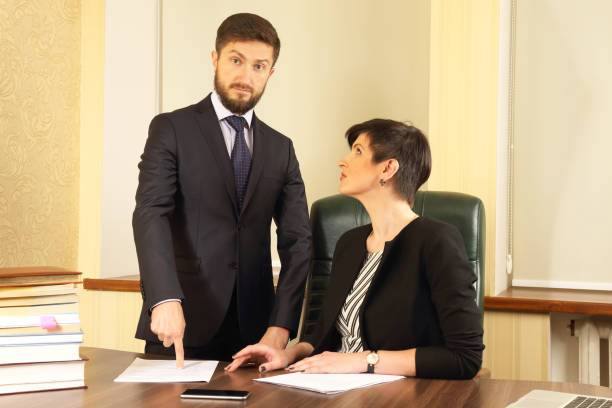 istock business partners in the office to discuss the documents 1139263105