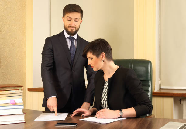 istock business partners in the office to discuss the documents 1139263311