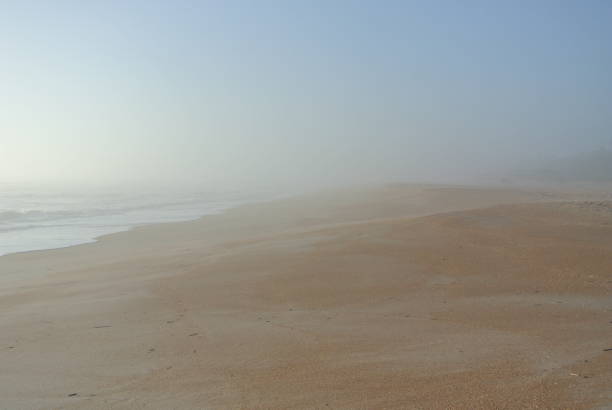 istock Beach shore in the fog 1139268549