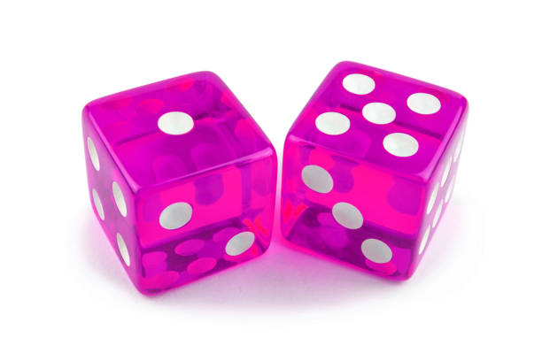 istock Two pink dice isolated on a white background. One and five are so close. 1139268934