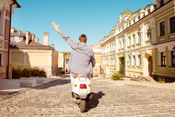 Rear view of the scooter driver