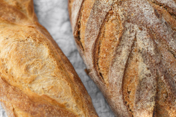 istock Closeup fresh baked bread on light blurred background 1139272792