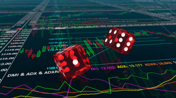 istock Rolling dice on stock trading charts 1139275548