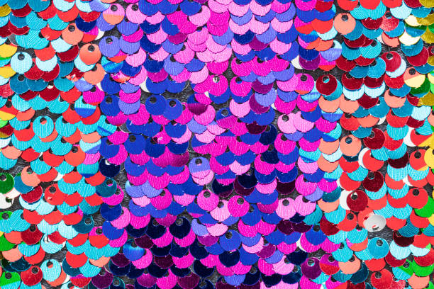 istock Multicolour Beautiful iridescent sequins texture, fish scale fabric background, close up 1139276372