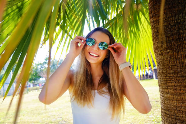 istock Cute girl having fun on a tropical vacation. 1139277648