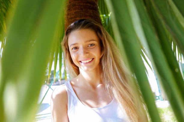 istock Cute girl having fun on a tropical vacation. 1139277663