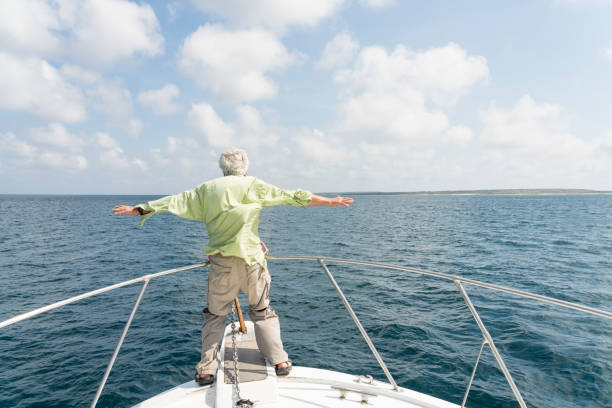 Senior man on the boat in Galapagos