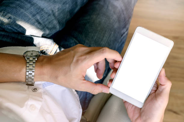 istock Closeup shot of man hand using smartphone, top view. 1139281630