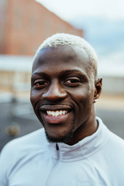 istock Smiling black athlete with dyed white hair 1139282727