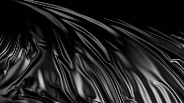 istock 3D rendering of black fabric. The fabric develops smoothly in the wind 1139283222
