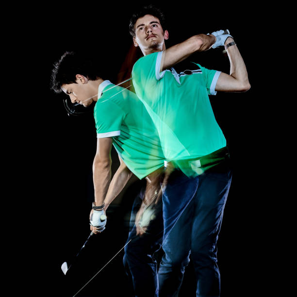 istock Golfer man golfing golf swing isolated black background multiple exposure 1139285968