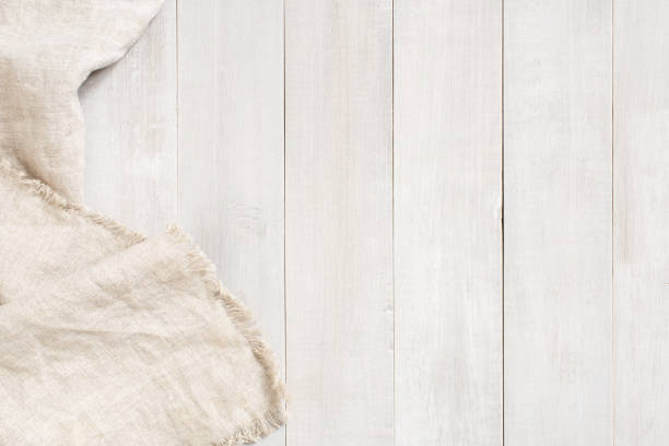 istock White wooden background decorated with linen napkin 1139286899
