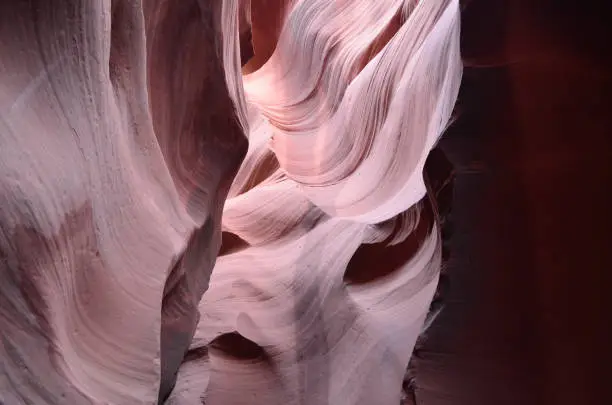 Gorgeous swirling red rock walls of Antelope Slot Canyon.
