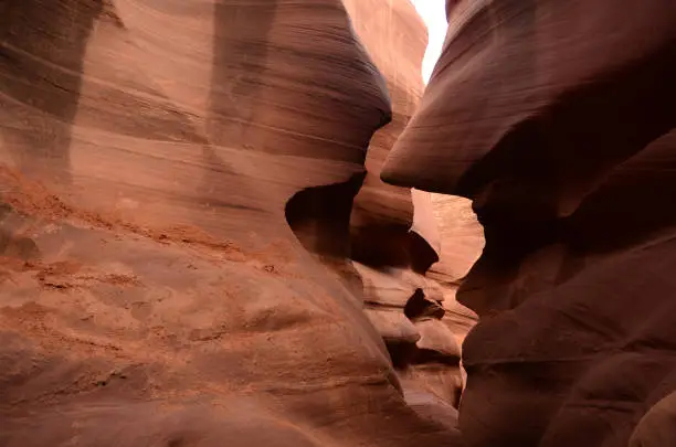 Red sandstone walls carved out from water ways.