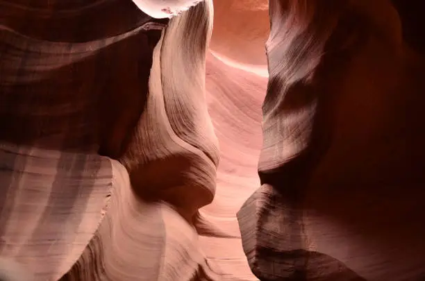 Sun shining on the red sandstone walls of Antelope Canyon in Arizona.