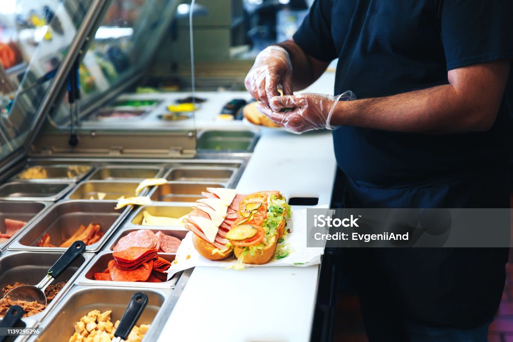 preparing sandwich in the restaurant the kitchen of fast food restaurant Fast Food Stock Photo