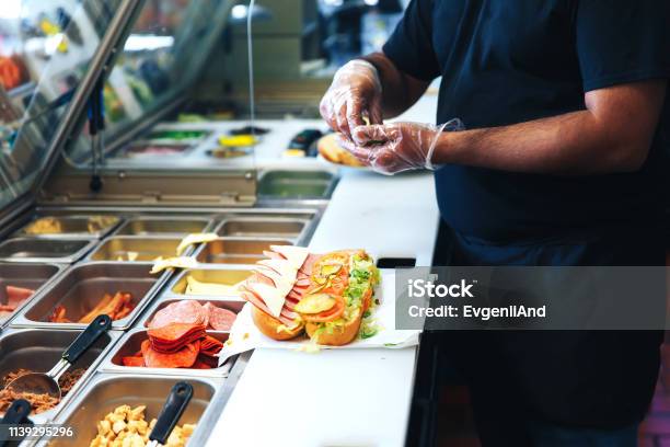 Preparing Sandwich In The Restaurant Stock Photo - Download Image Now - Fast Food, Store, Serving Food and Drinks