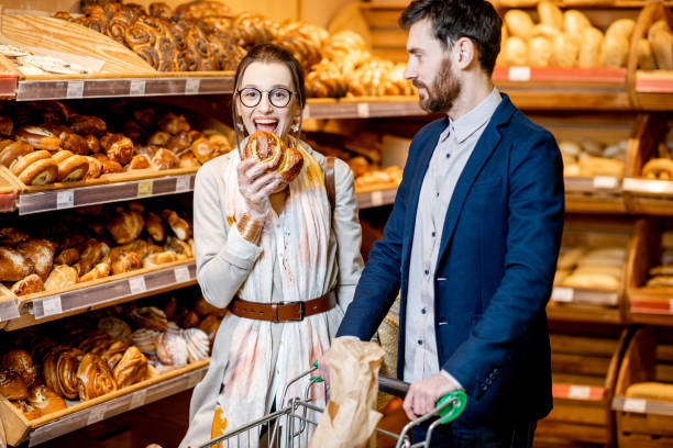 istock Couple choosing bakery in the supermarket 1139295726