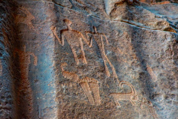 istock Ancient inscriptions at Khazali siq at Wadi Rum desert in jordan 1139297483