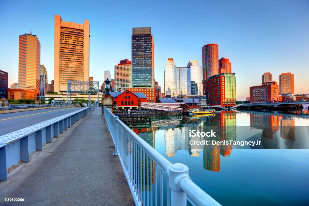 Boston skyline along Fort Point Boston is known for its central role in American history, world-class educational institutions, cultural facilities, and champion sports franchises Boston - Massachusetts Stock Photo
