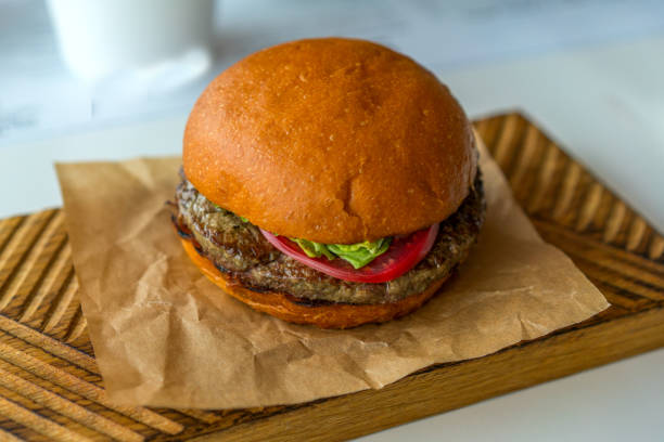 istock small hamburger on a wooden base 1139317748
