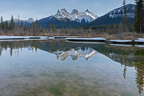 evening view of the three sisters mountain peaks in Camore, Canada