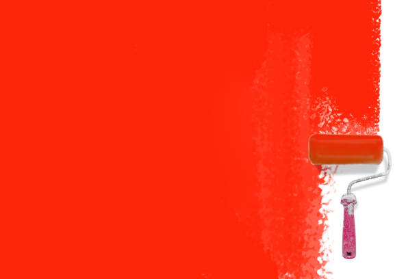 istock paint roller brush  painting red backgrounbd - Creative renovation concept  - 1139321819