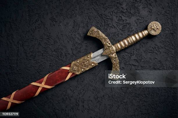 Ancient Knightly Sword Of The Era Of The Crusades Stock Photo - Download Image Now - Sword, Shield, Knight - Person