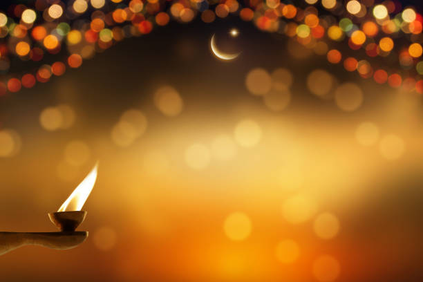 festive background with oil lamp and moon and star