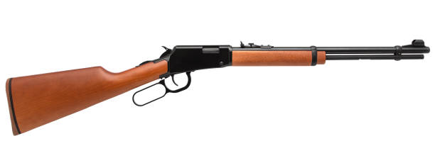 istock Old American wild west rifle isolated on white background 1139330548