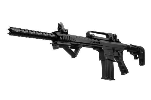 istock Black automatic shotgun isolated on white background 1139330690