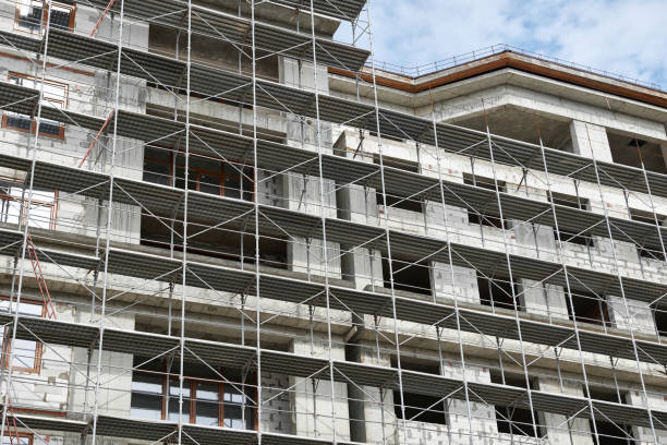 istock new building under construction, scaffolding and concrete 1139331951